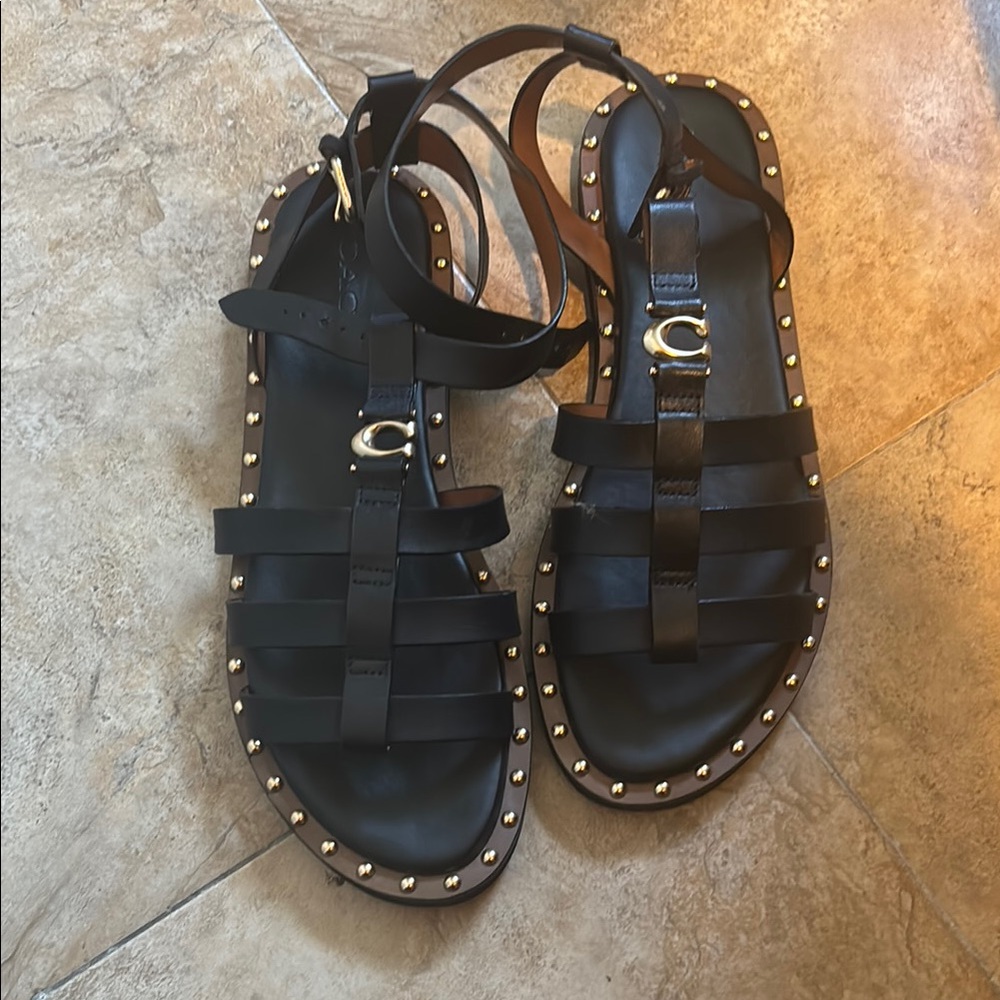 Coach Black and Gold Sandals with Modern Design